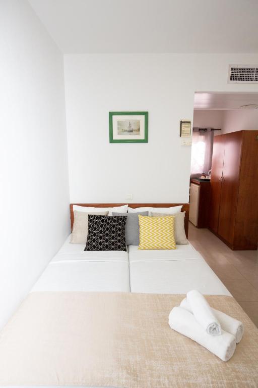 Postel nebo postele na pokoji v ubytování Motel Aviv