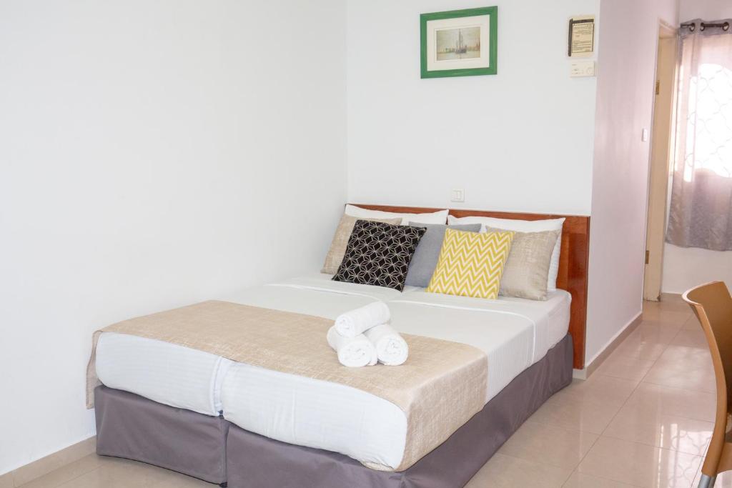 Postel nebo postele na pokoji v ubytování Motel Aviv