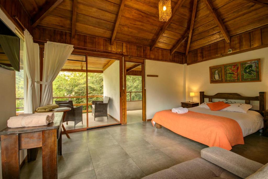 Postel nebo postele na pokoji v ubytování Terrabambu Lodge