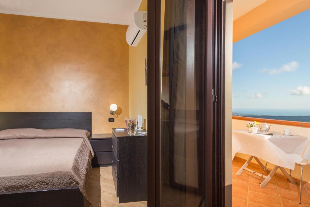 Postel nebo postele na pokoji v ubytování B&B Montemare