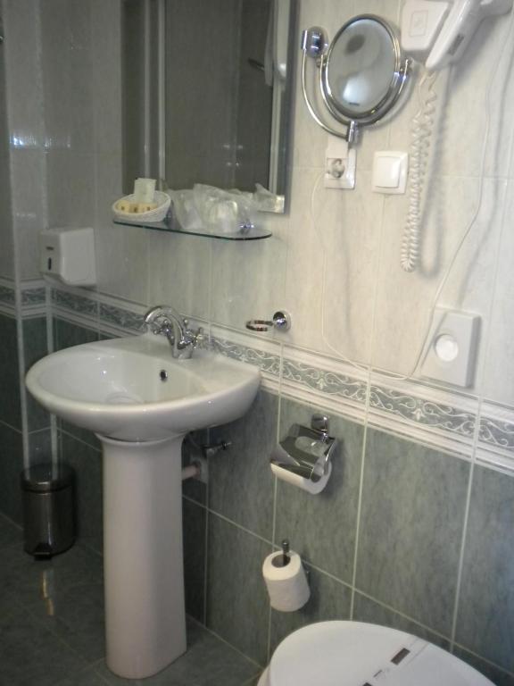 Koupelna v ubytování Hotel Ary