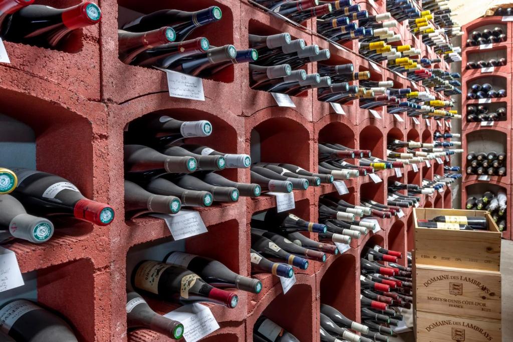 a wall of wine bottles in a wine cellar at Le Kaïla in Méribel