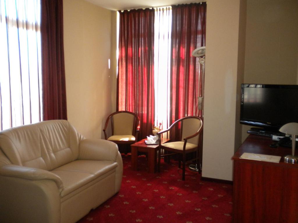TV a/nebo společenská místnost v ubytování Hotel Ary