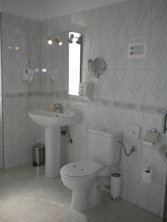 Koupelna v ubytování Hotel Ary