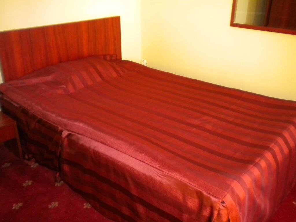 Postel nebo postele na pokoji v ubytování Hotel Ary