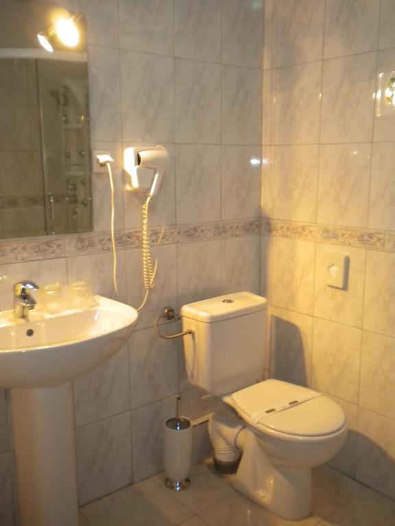 Koupelna v ubytování Hotel Ary
