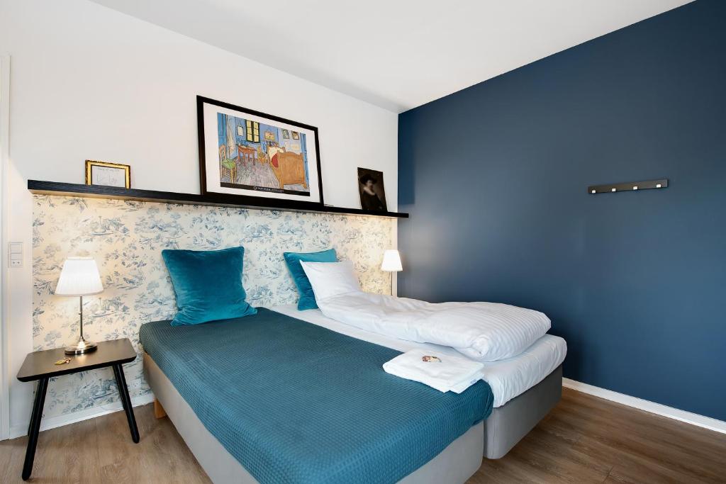 Postel nebo postele na pokoji v ubytování Årslev B&B