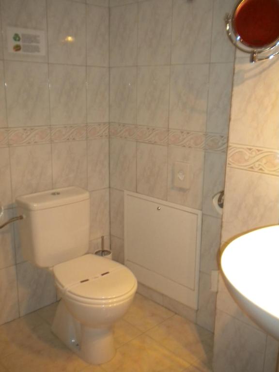 Koupelna v ubytování Hotel Ary