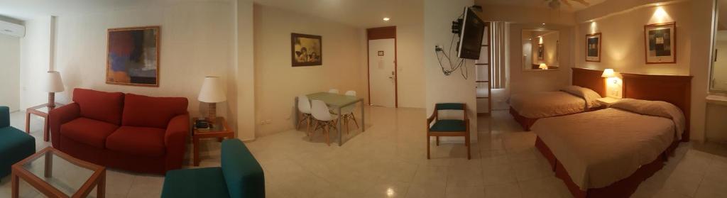 Posezení v ubytování Hotel y Suites Nader