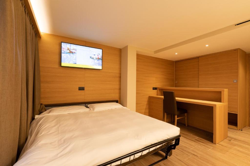 Postel nebo postele na pokoji v ubytování Hotel Centro's