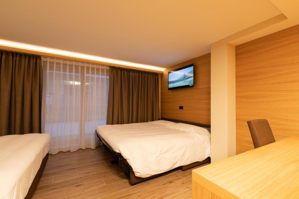 Postel nebo postele na pokoji v ubytování Hotel Centro's
