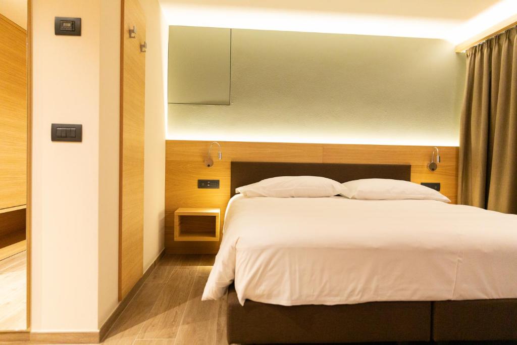 Postel nebo postele na pokoji v ubytování Hotel Centro's