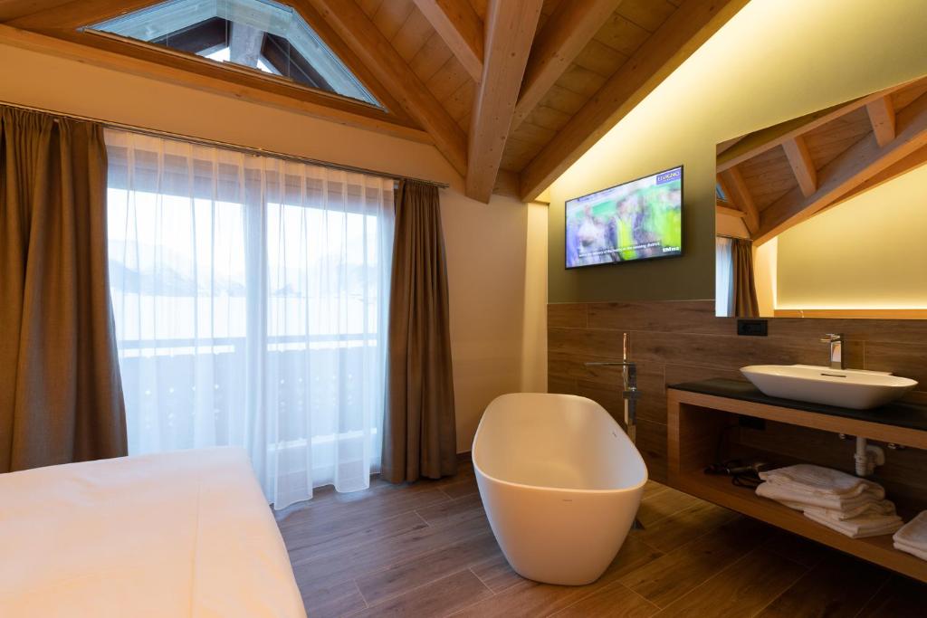 TV a/nebo společenská místnost v ubytování Hotel Centro's