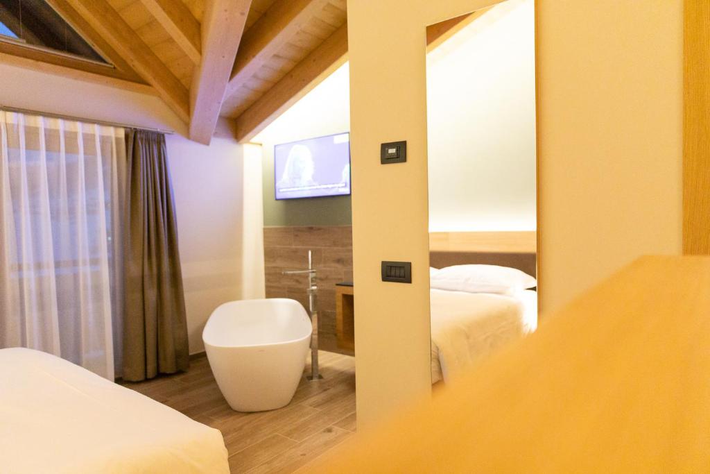 Postel nebo postele na pokoji v ubytování Hotel Centro's