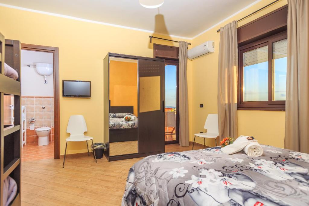 Postel nebo postele na pokoji v ubytování B&B Montemare