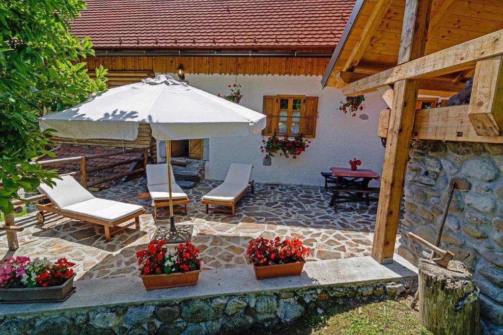 Vonkajšia záhrada v ubytovaní Sobol in Kočičin (Haus für 6-9 Personen)