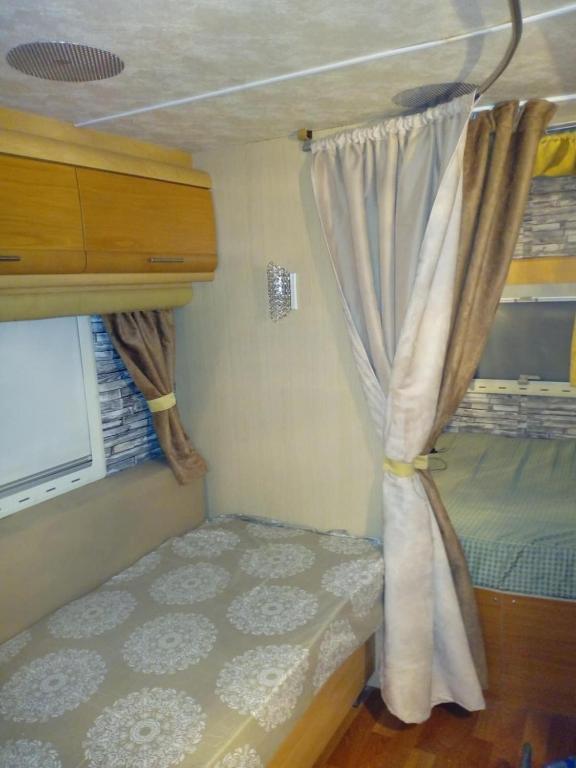 Postel nebo postele na pokoji v ubytování Camping Pitsoni