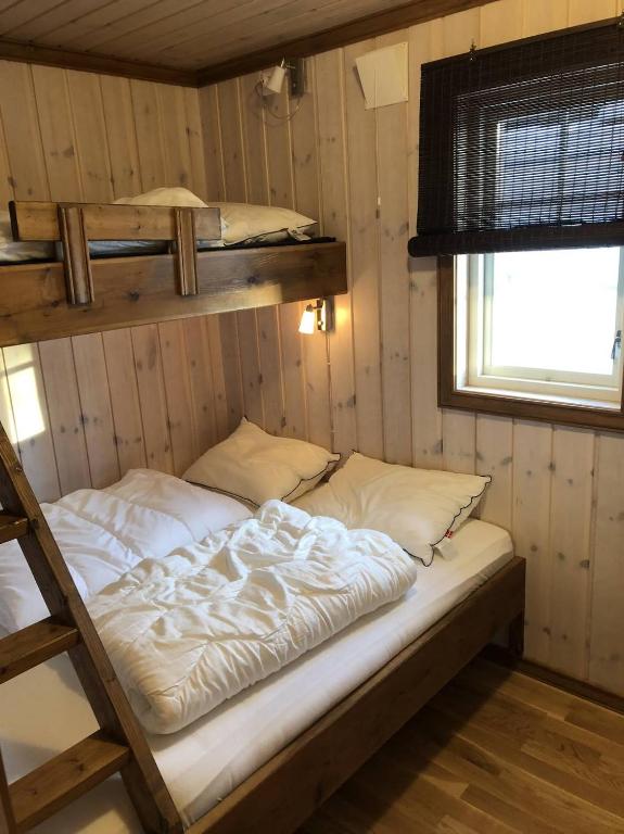 Postel nebo postele na pokoji v ubytování Haglebu Turistheim