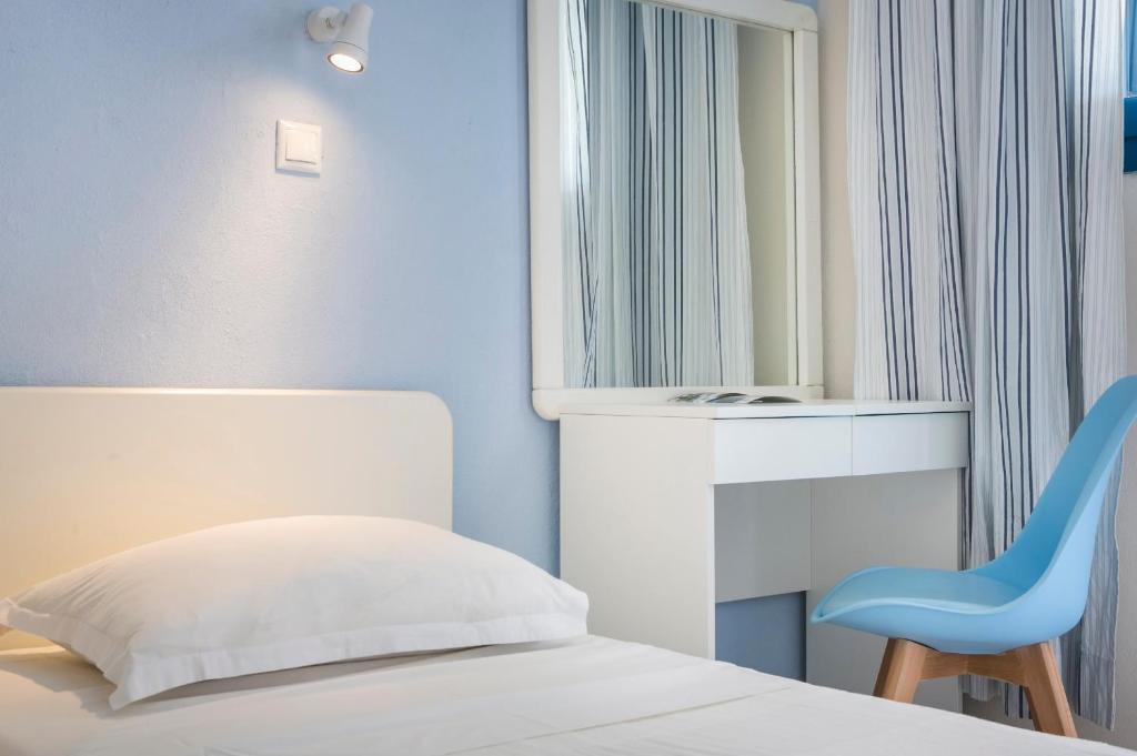 Postel nebo postele na pokoji v ubytování Metaxatos Apartments