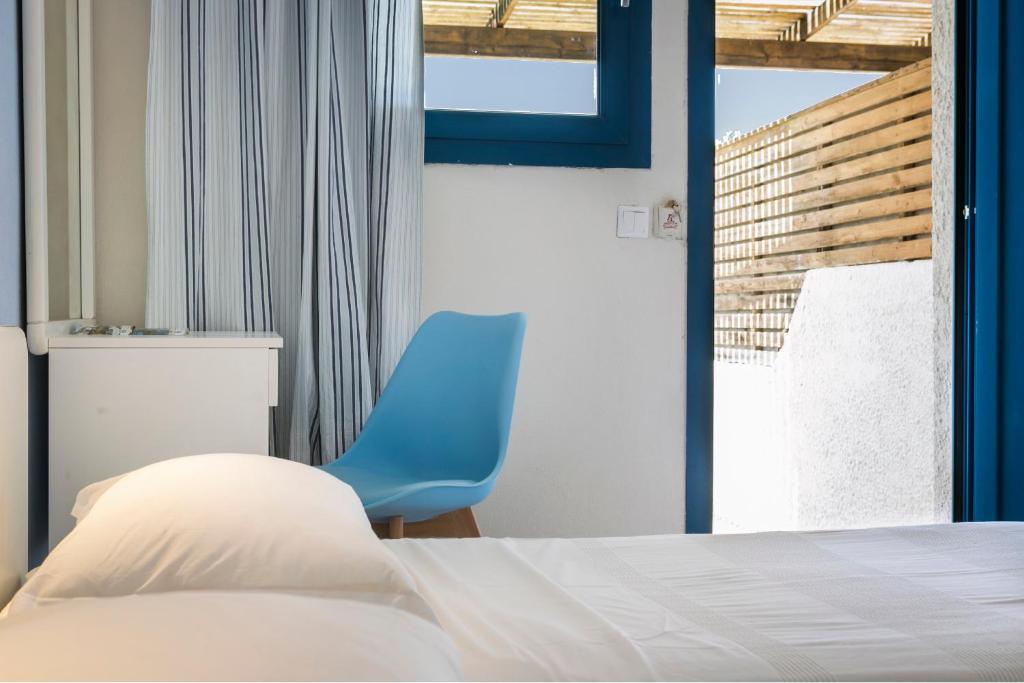 Postel nebo postele na pokoji v ubytování Metaxatos Apartments