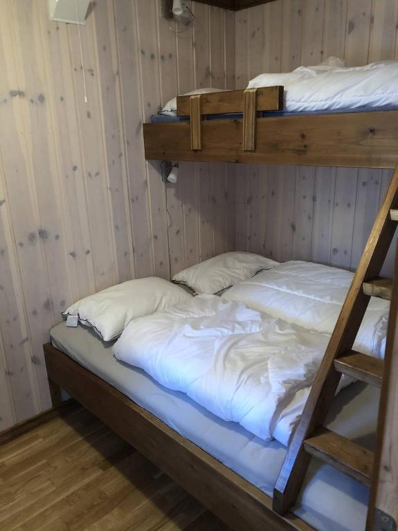 Postel nebo postele na pokoji v ubytování Haglebu Turistheim