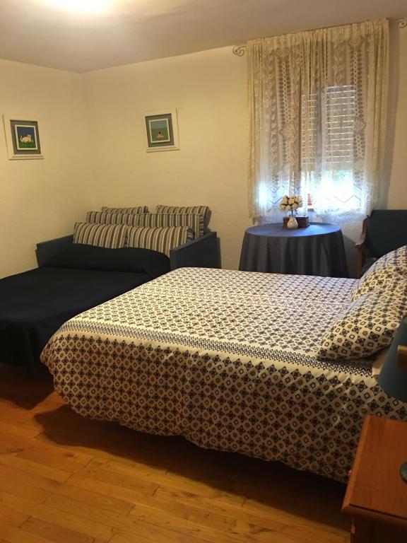 Postel nebo postele na pokoji v ubytování Casa Sanabresa