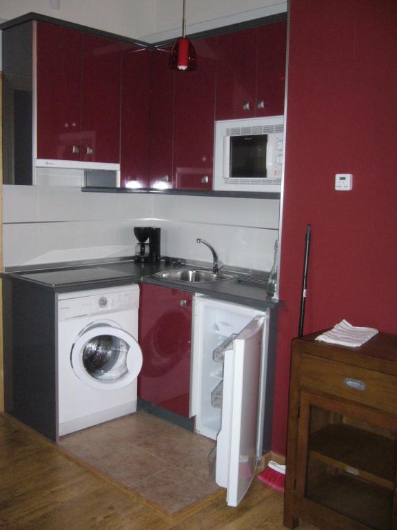 Kuchyň nebo kuchyňský kout v ubytování Apartamentos Cañardo Autural