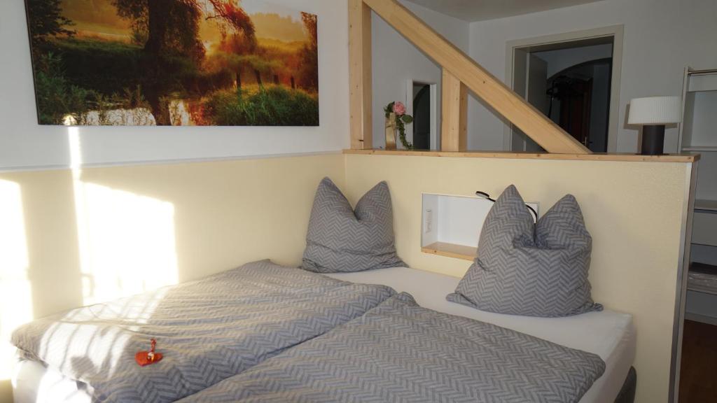 Postel nebo postele na pokoji v ubytování Ferienhaus am Rehberg
