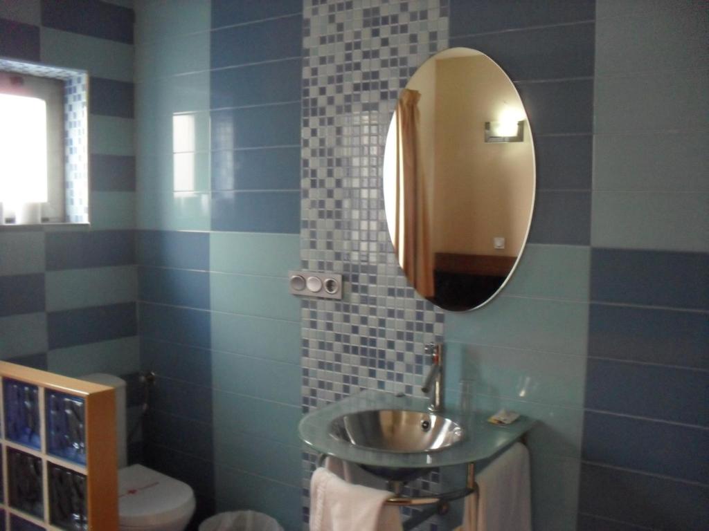 Koupelna v ubytování Hotel El Cruce Moraleda
