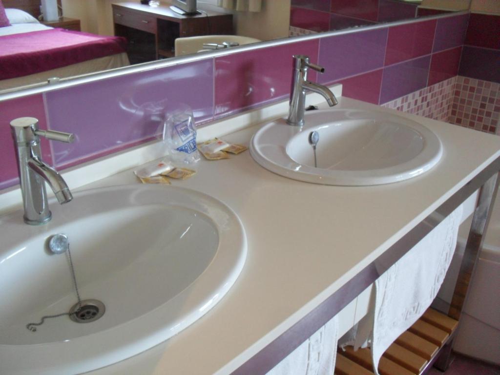 Koupelna v ubytování Hotel El Cruce Moraleda