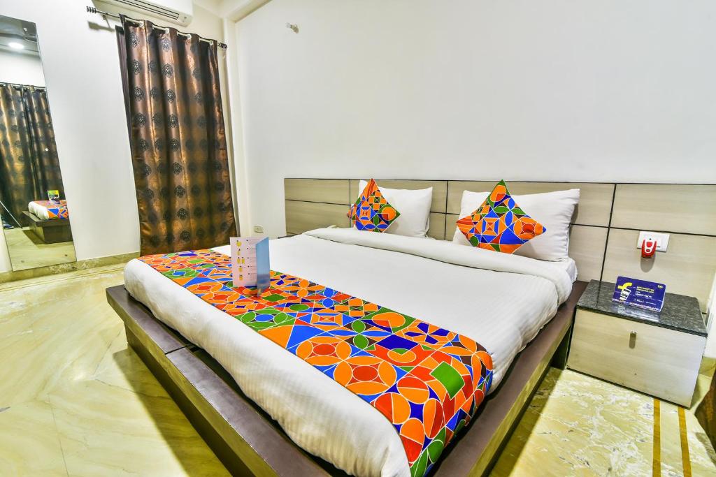 Postel nebo postele na pokoji v ubytování FabHotel Rallkmas Cyber City