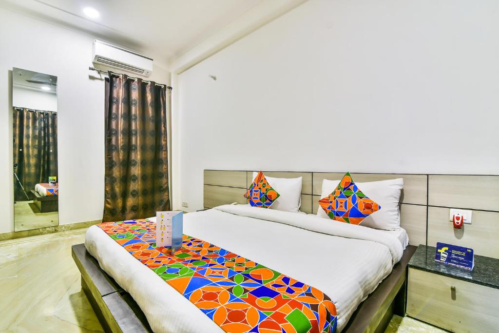 Postel nebo postele na pokoji v ubytování FabHotel Rallkmas Cyber City