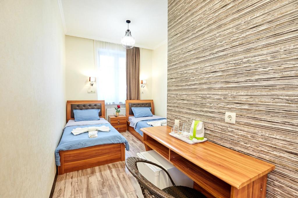 Postel nebo postele na pokoji v ubytování Hotel Diadema