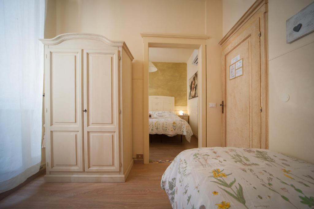 Postel nebo postele na pokoji v ubytování Albergo Etruria