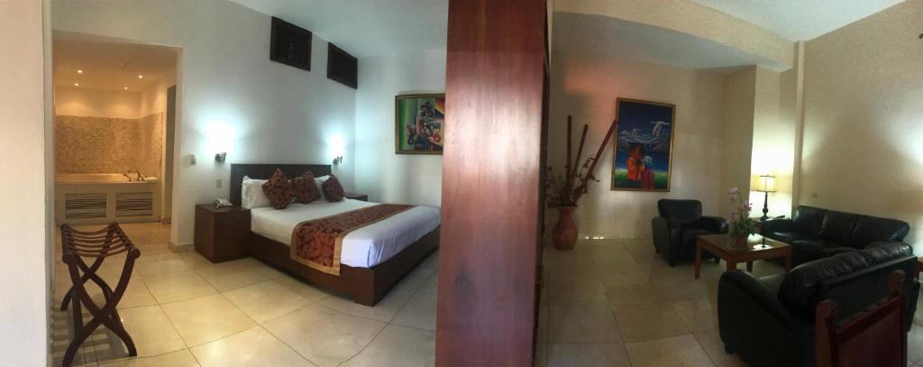 Postel nebo postele na pokoji v ubytování Boutique Hotel Palacio