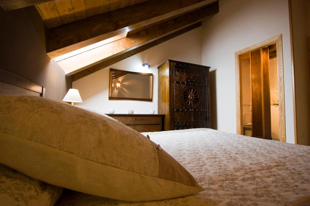 Postel nebo postele na pokoji v ubytování Apartamentos Cañardo Autural