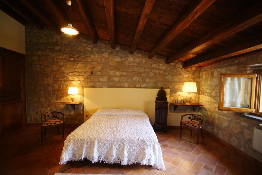 Postel nebo postele na pokoji v ubytování B&B Sciabakè