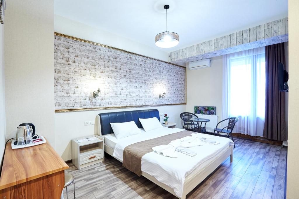 Postel nebo postele na pokoji v ubytování Hotel Diadema
