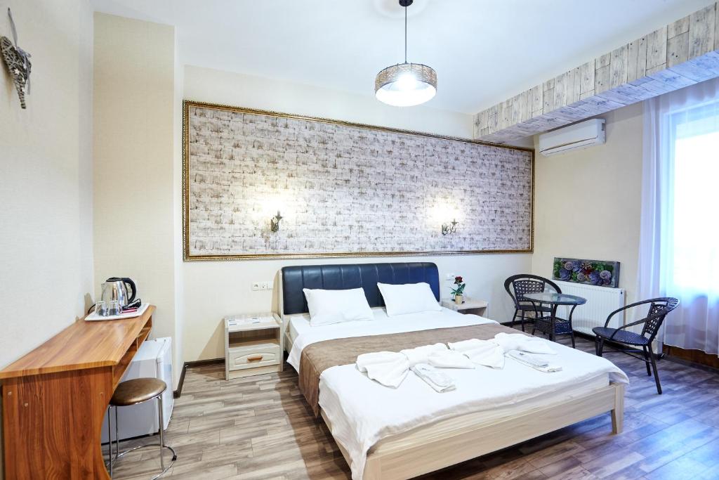 Postel nebo postele na pokoji v ubytování Hotel Diadema