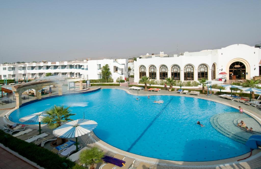 Bazén v ubytování Dreams Vacation Resort - Sharm El Sheikh nebo v jeho okolí