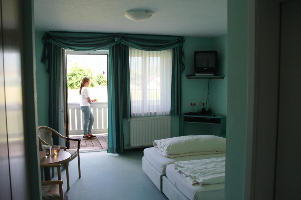 Postel nebo postele na pokoji v ubytování Gasthof Hotel zur Post