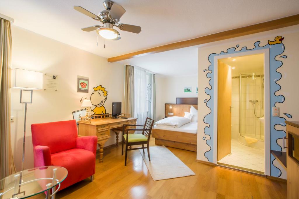 Postel nebo postele na pokoji v ubytování Hotel Brunner