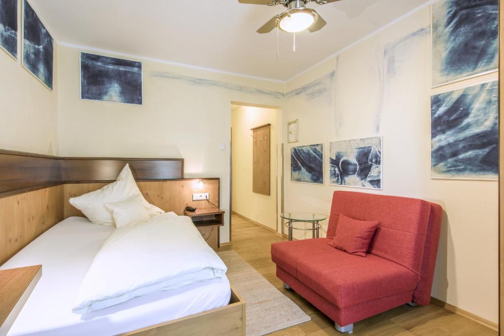Postel nebo postele na pokoji v ubytování Hotel Brunner