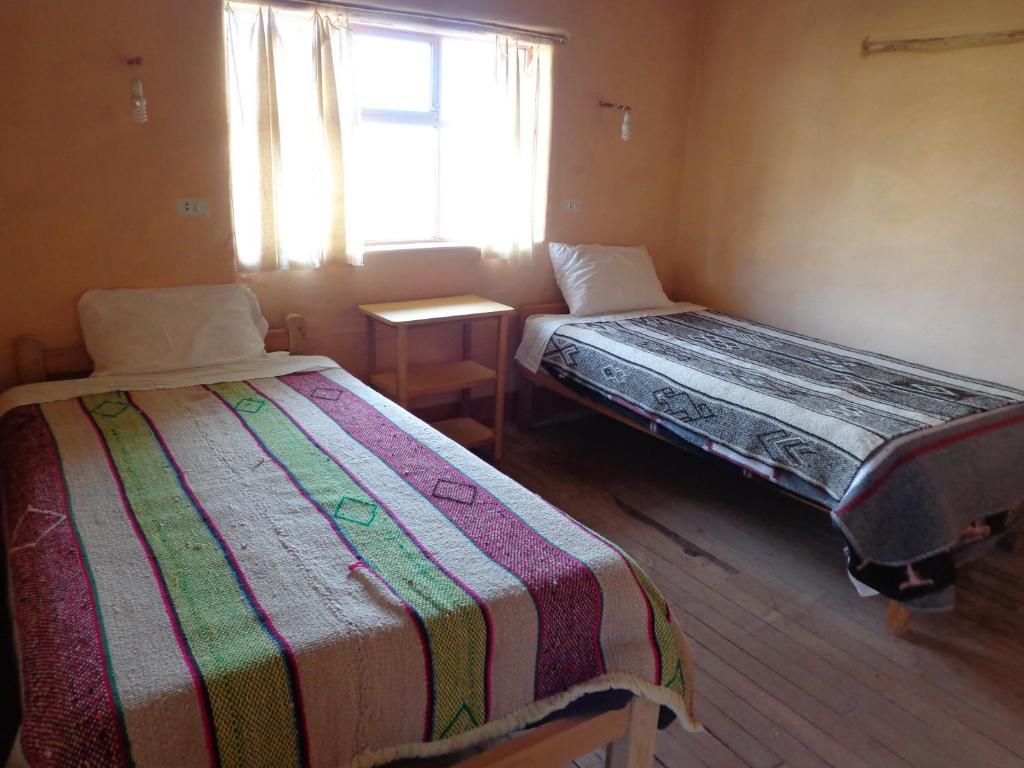 Postel nebo postele na pokoji v ubytování "Casa de Valentin"