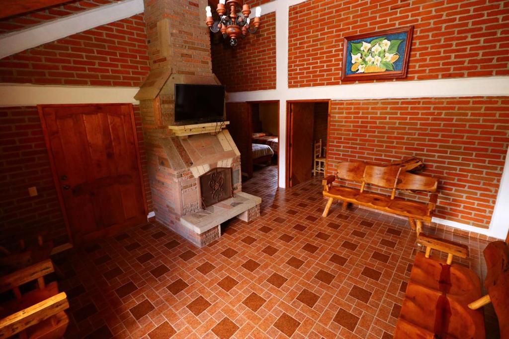 Posezení v ubytování Cabañas Rincón Escondido