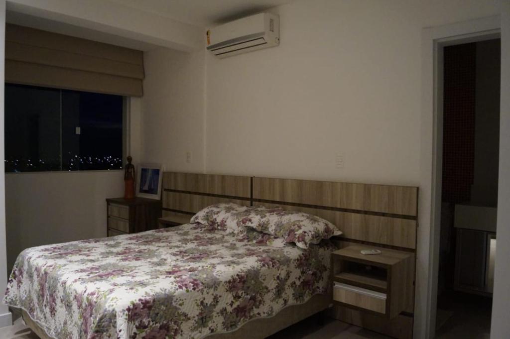 Cama o camas de una habitación en Suíte para duas pessoas
