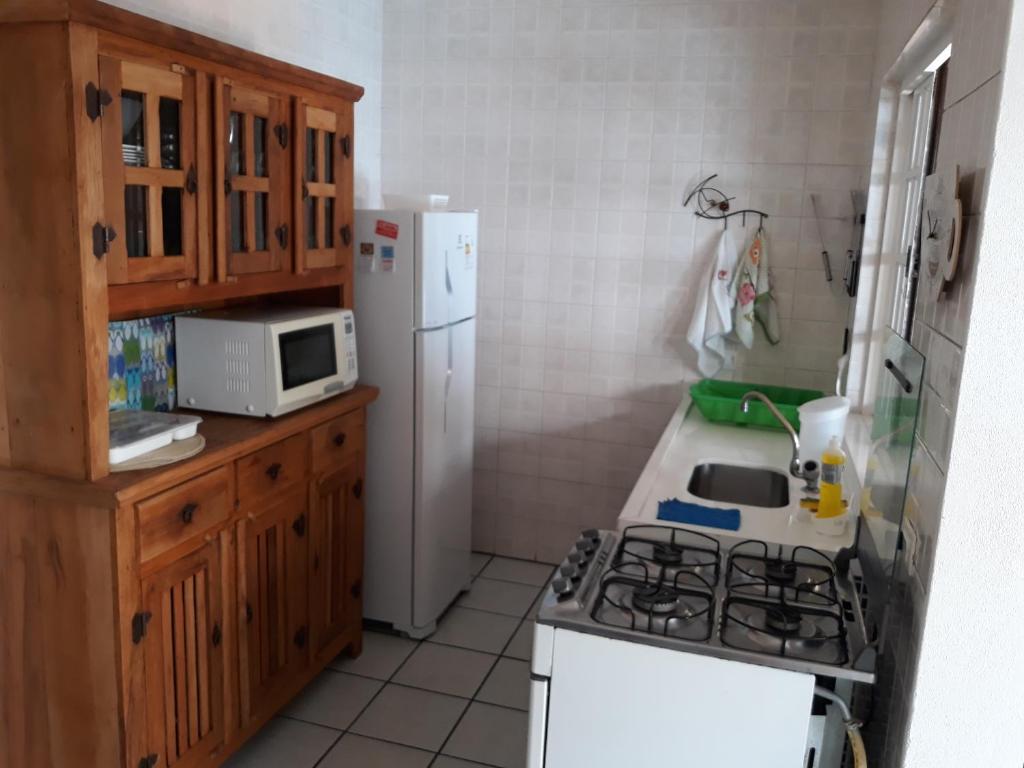 Kuchyň nebo kuchyňský kout v ubytování Casa em condomínio
