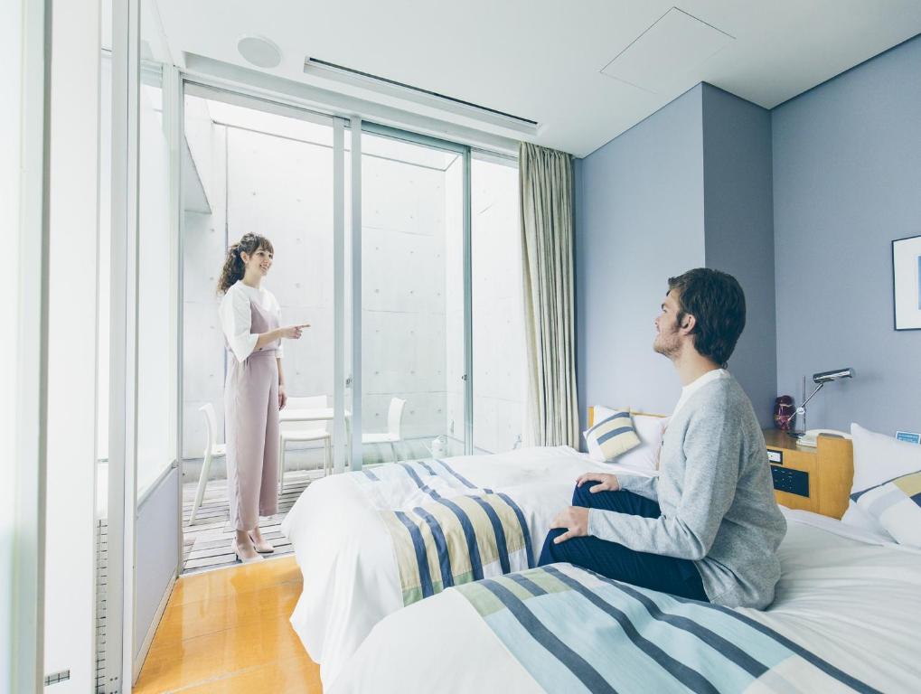 Postel nebo postele na pokoji v ubytování Hotel Flex