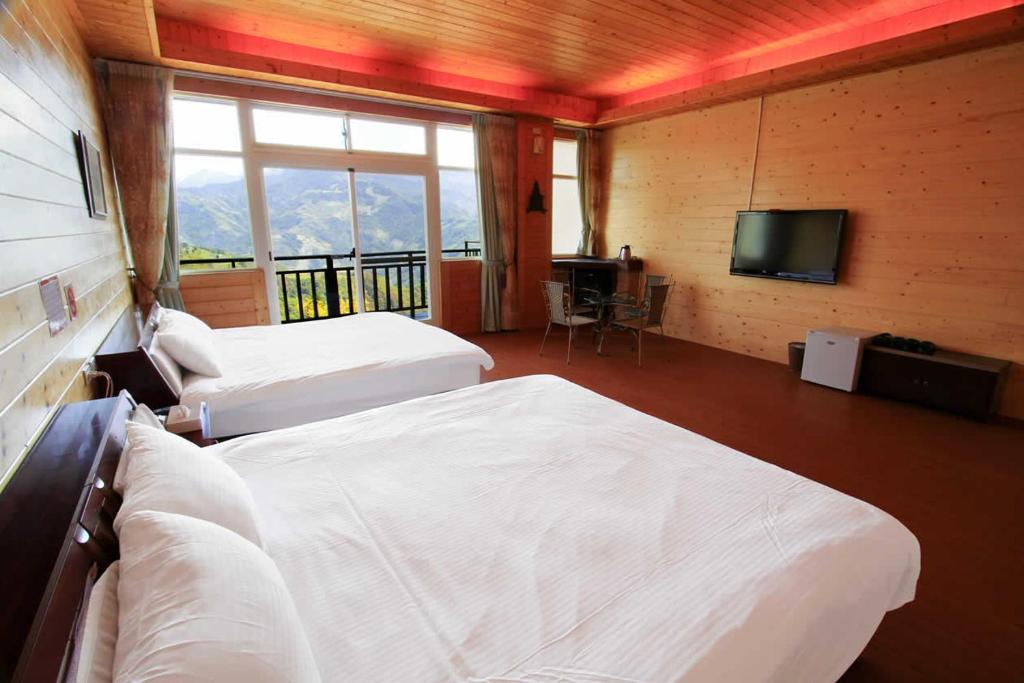 Postel nebo postele na pokoji v ubytování Yun Meng Xianjing Homestay