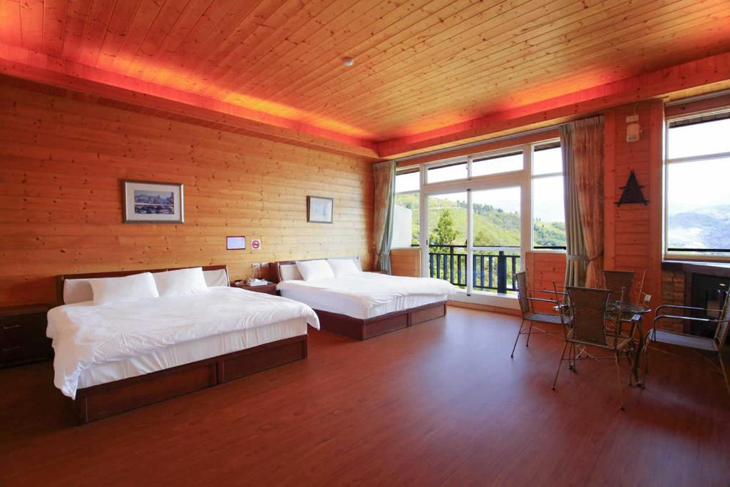 Postel nebo postele na pokoji v ubytování Yun Meng Xianjing Homestay